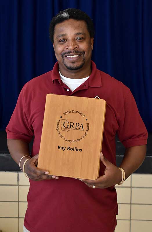 Ray Rollins accepts 2020 GRPA award.