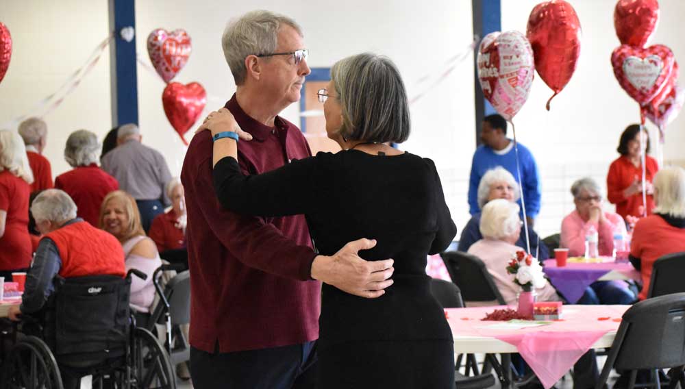 Couple dancing at Tucker Rec Center's Valentines Dance in February of 2020.