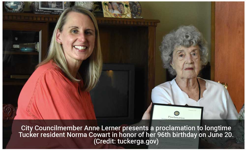 Anne Lerner visits with Tucker resident Norma Cowert.