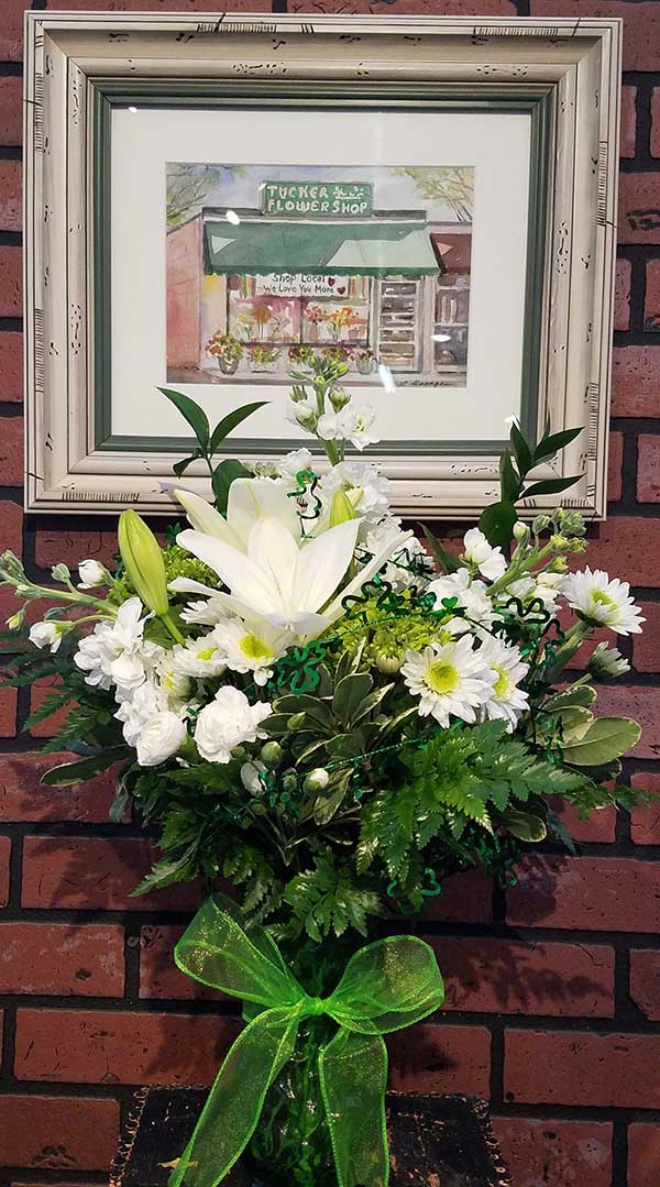 InTucker-June2022 Tucker Flower Shop painting and floral arrangement.