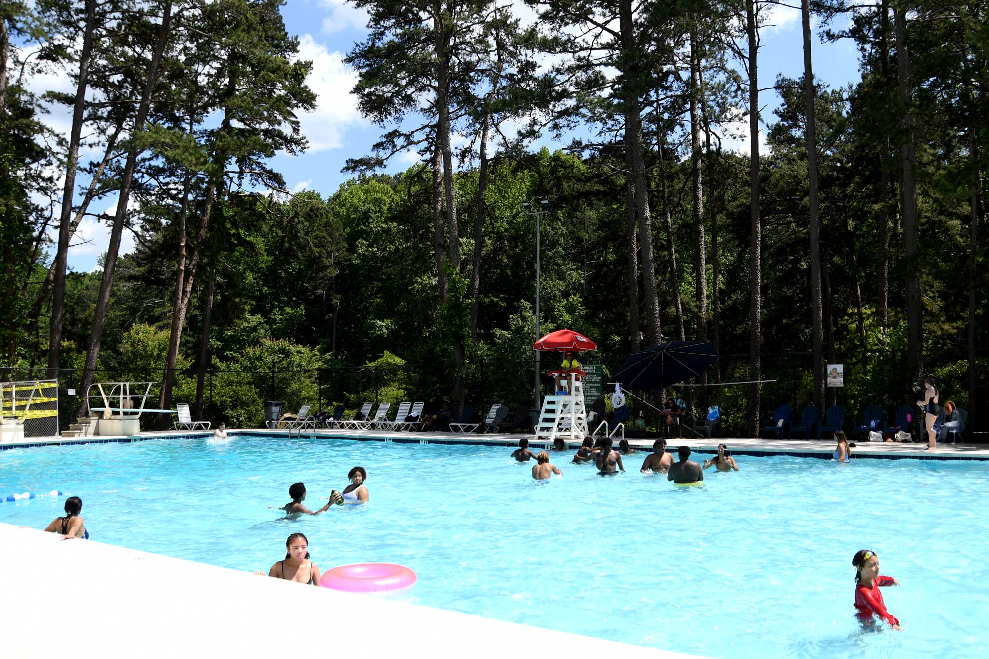 Families enjoying the pool at Kelley Cofer Park.