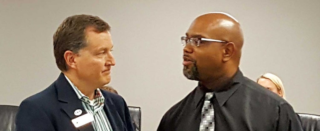 People talking at a meeting
