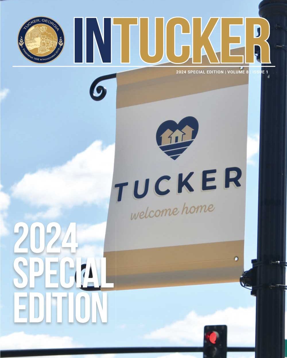 InTucker Cover of the 2024 special edition shows the heart logo for the City on a light pole banner on Main Street.