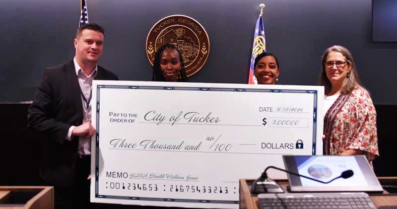 GMA presents grant award to Tucker Wellness Committee.