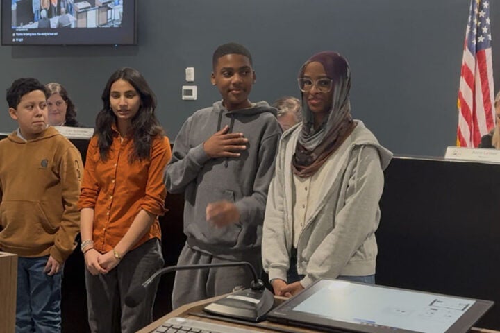 Tucker Middle School STEM students led the Pledge of Allegiance.