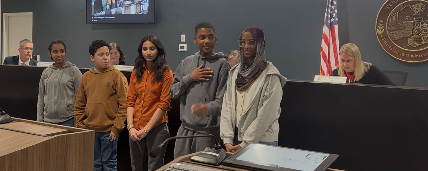 Tucker Middle School STEM students led the Pledge of Allegiance.