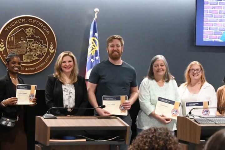 TKR 101 graduates receive their certificate from Mayor Pro Tem Virginia Rece.